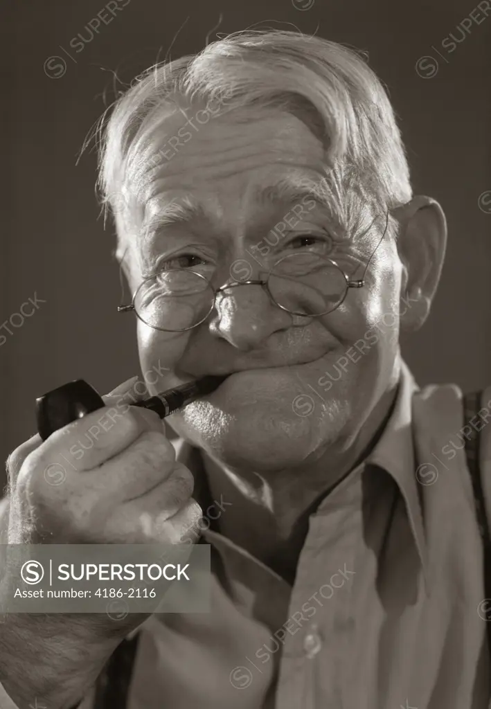 1930S 1940S Smiling Character Elderly Man Smoking Pipe