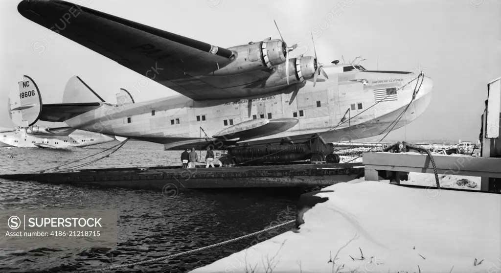 1930s 1940s PAN AMERICAN AIRWAYS FLYING BOAT BOEING 314 AT DOCK OUT OF THE WATER 