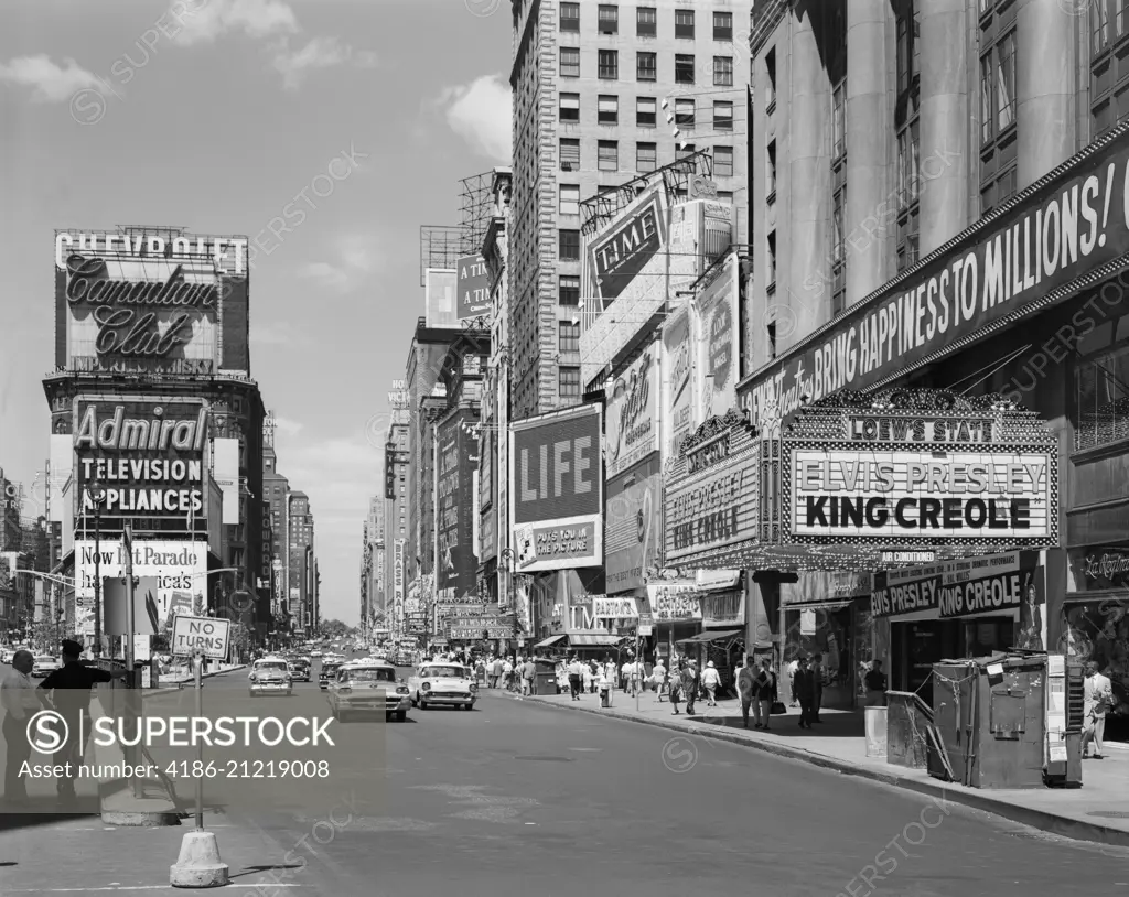 1950s TIMES SQUARE VIEW NORTH UP 7TH AVE AT 45TH ST KING CREOLE STARRING ELVIS PRESLEY ON LOWES STATE THEATRE MARQUEE NYC USA