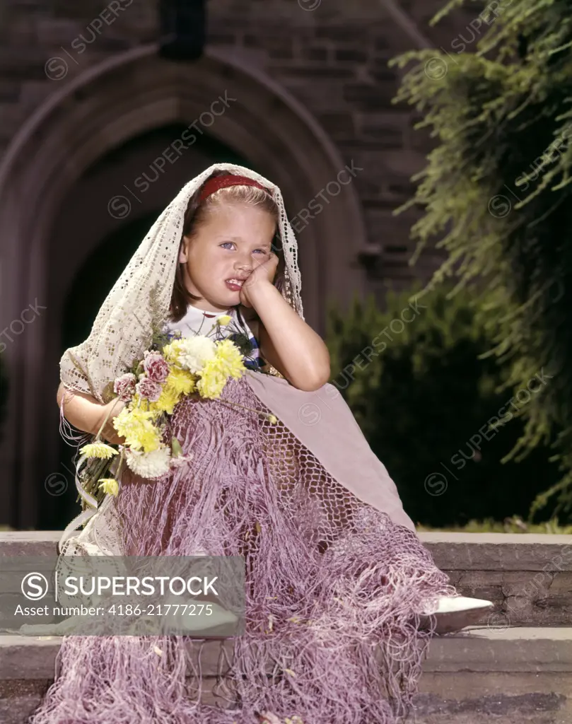 1960s UNHAPPY LITTLE GIRL SITTING IN FRONT OF CHURCH JILTED LEFT WAITING AT THE ALTAR