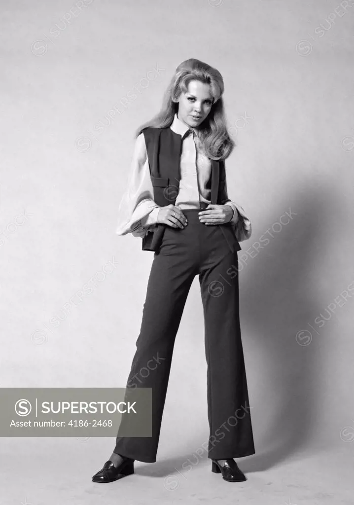 1960S 1970S Portrait Woman With Long Blond Hair Wearing Flared Pantsuit With Vest