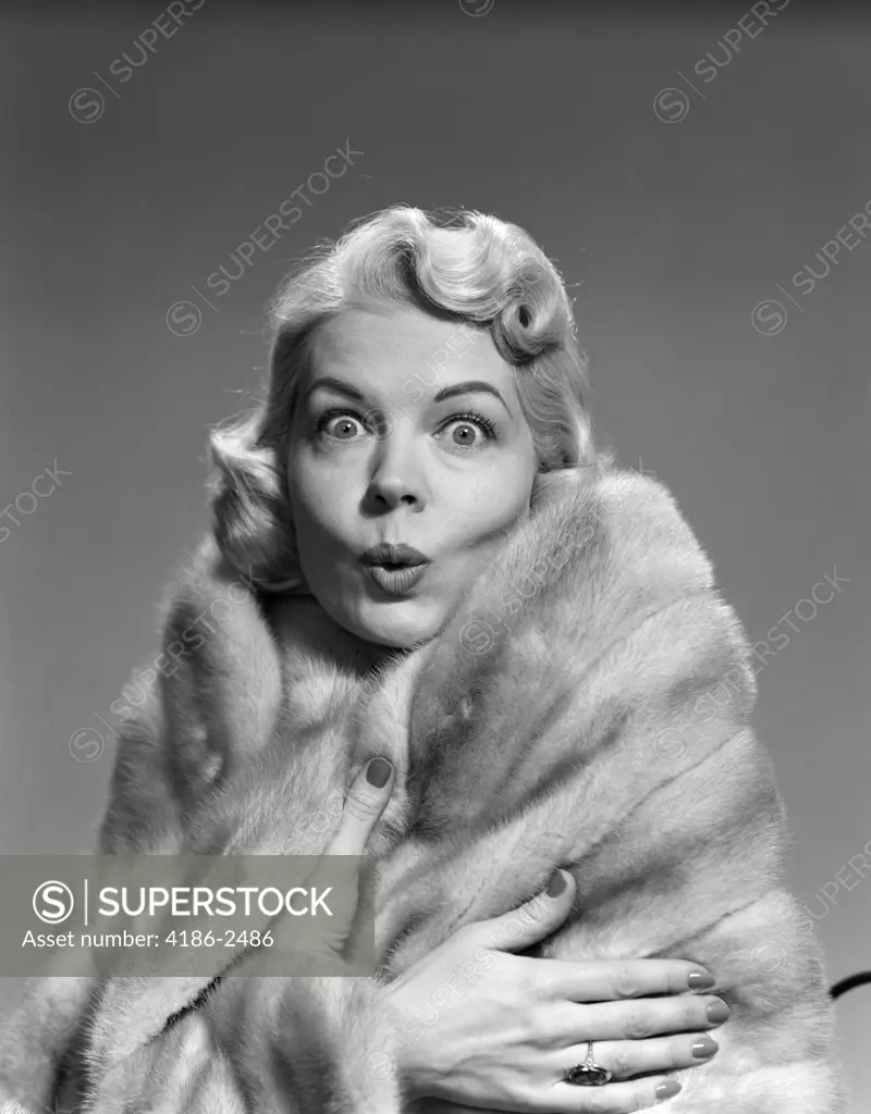 1950S Woman Wrapped In Fur Stole Making Funny Facial Expression