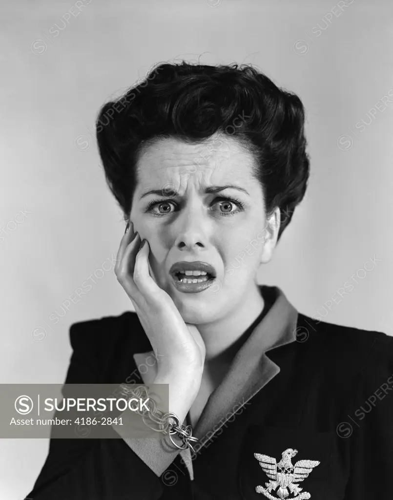 1940S Portrait Of Woman With Shocked Expression Looking At Camera