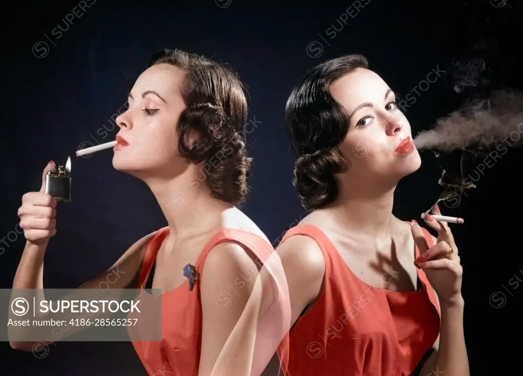 1960s MULTIPLE EXPOSURE TWO VIEWS BRUNETTE WOMAN SMOKING A CIGARETTE LIGHTING IT AND EXHALING SMOKE LOOKING AT CAMERA