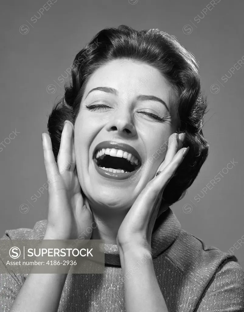 1950S 1960S Happy Brunette Woman Smiling Laughing Yelling Hands To Cheeks Eyes Closed