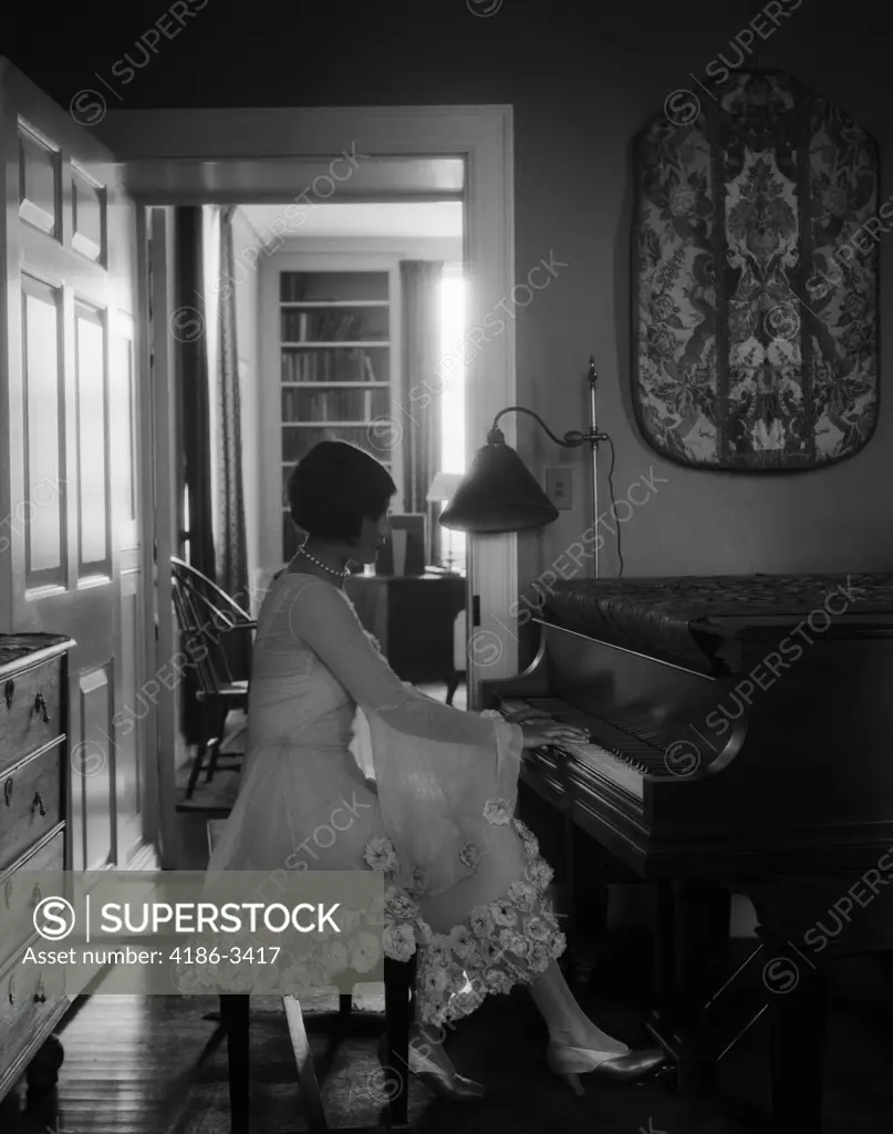 1920S Woman Pianist Sitting Playing Piano