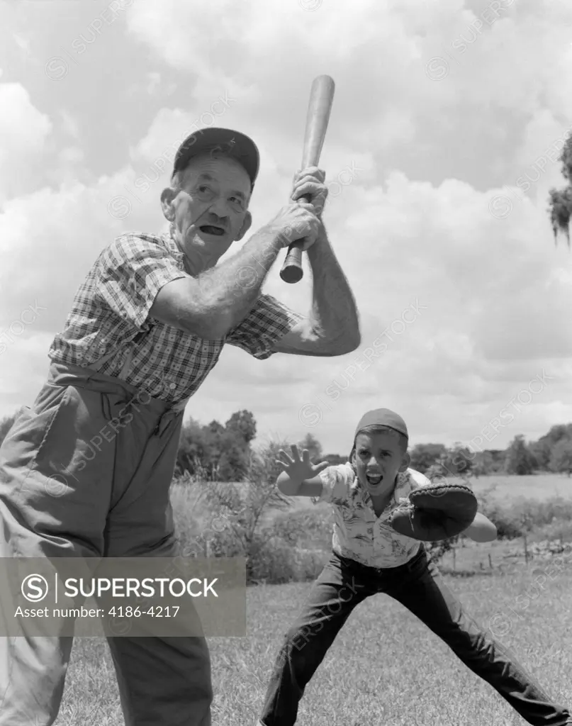 1950S Grandfather At Bat With Boy As Catcher