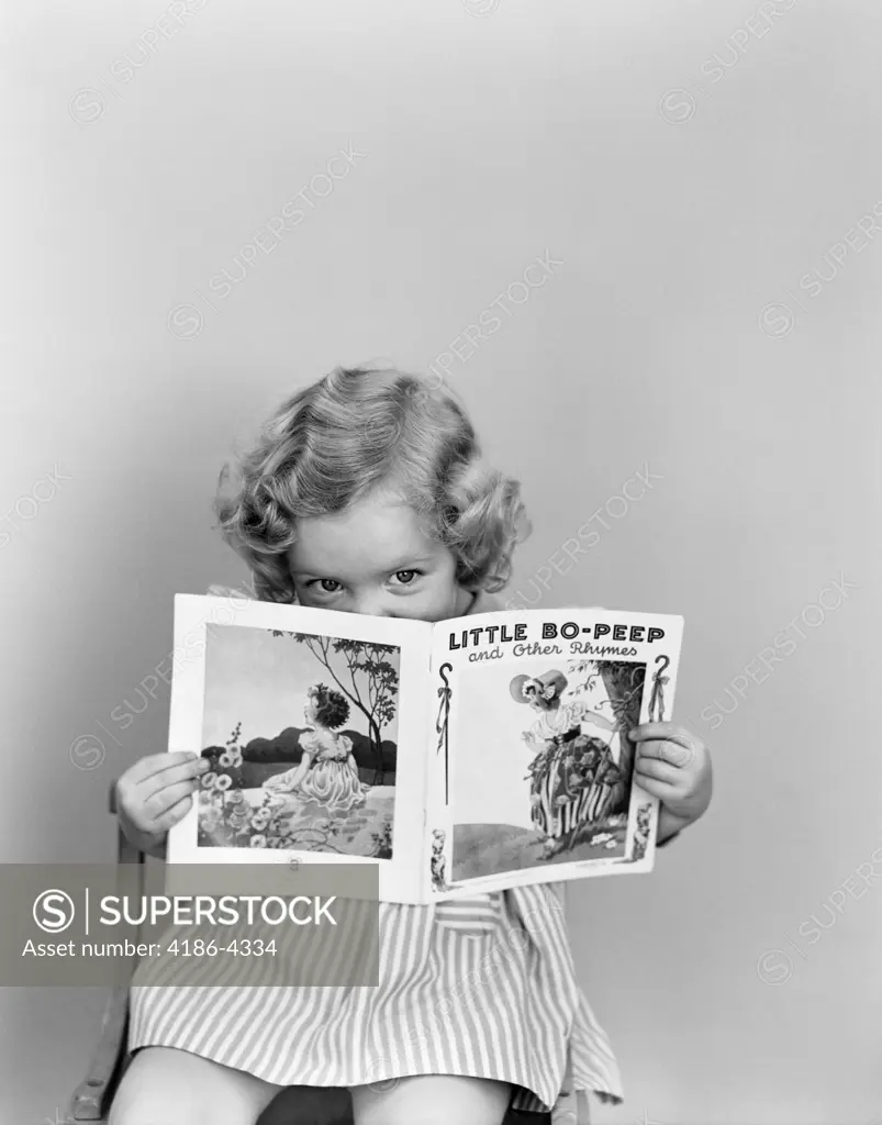 1940S Little Girl Peeking Over Top Of Little Bo-Peep Nursery Rhyme Book