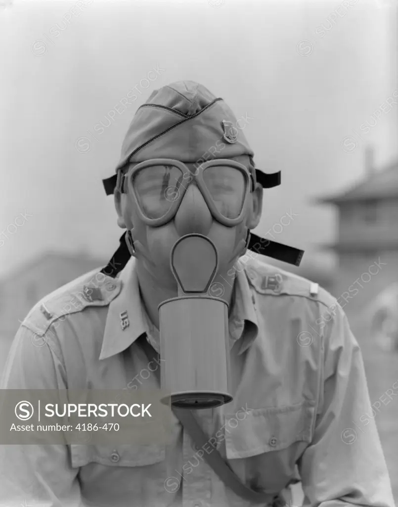 1942 Man Soldier Army Lieutenant Wearing A Gas Mask