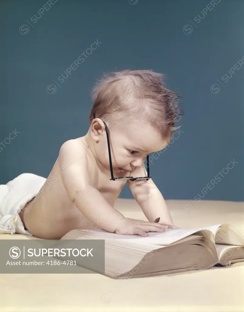 1960S Funny Baby Wearing Oversized Glasses Reading Big Book