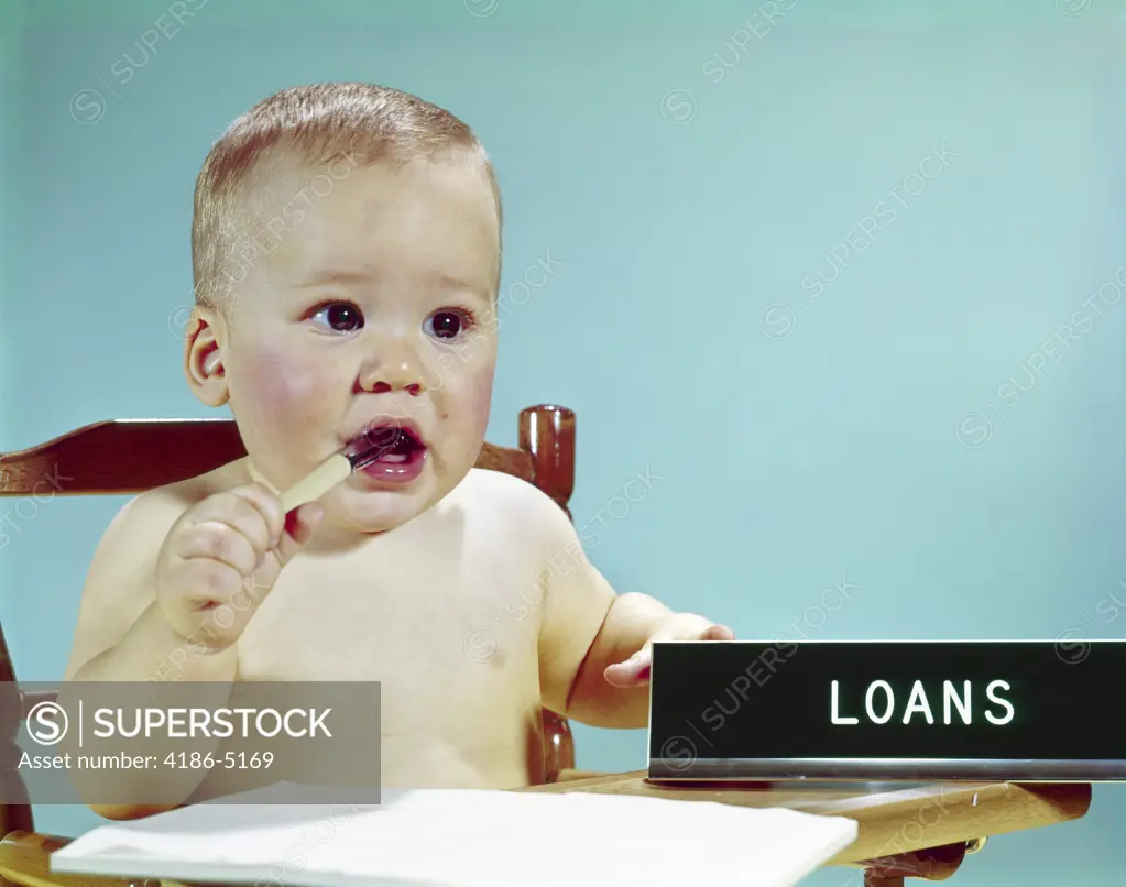 1960S Serious Thoughtful Baby As Banking Loan Officer