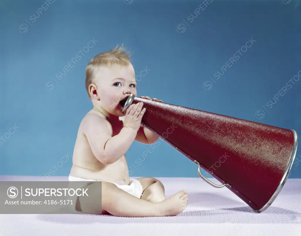 1960S Baby Holding Speaking Into A Large Megaphone