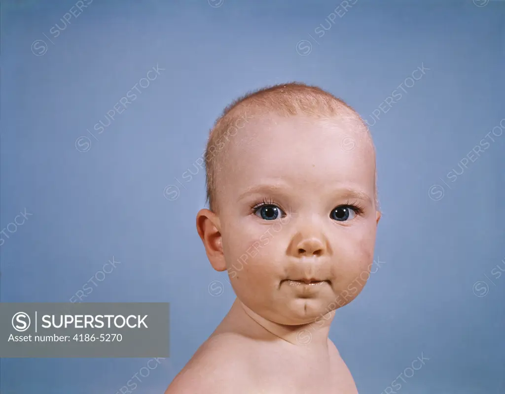 1970S Portrait Baby Blue Background Pursed Lips Facial Expression