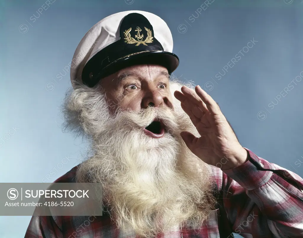 1960S Senior Man Full White Beard Wear Ship Captains Hat Shouting With Hand Cupped To Mouth