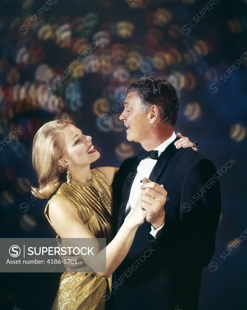 1960S Couple In Formal Clothes Dancing Multiple Light Background Celebration Anniversary Man Woman