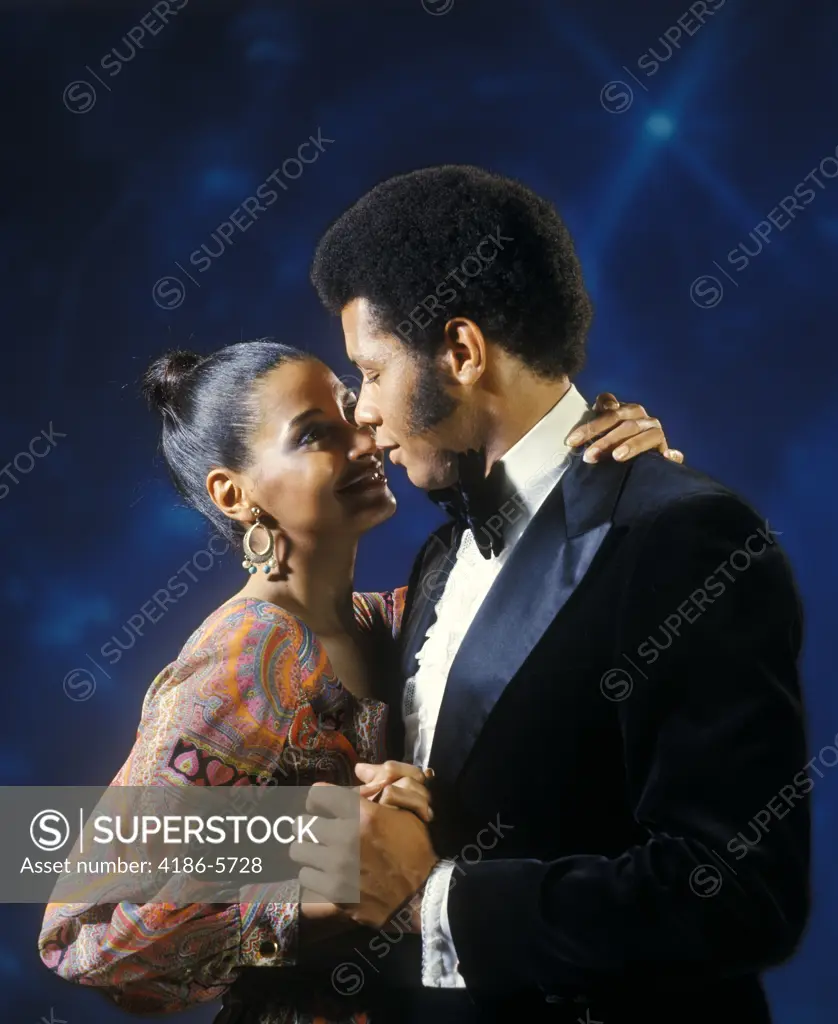 1970S African American Couple Man Tuxedo Woman Evening Dress Dancing Embracing