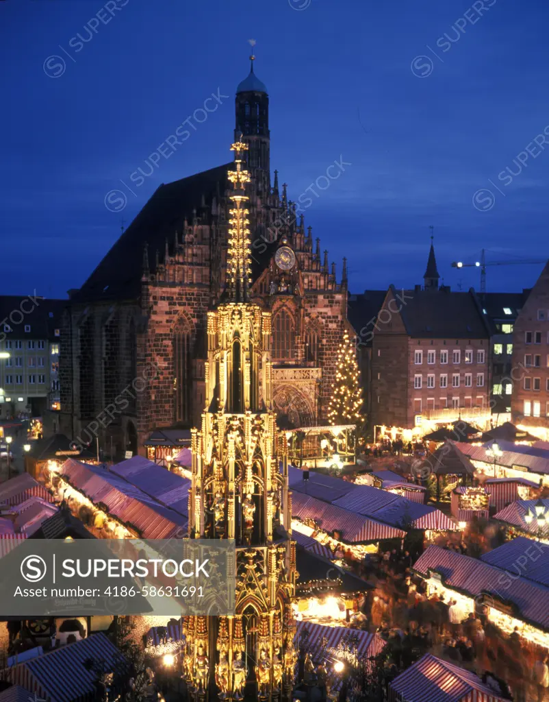 NURNBERG GERMANY OUTDOOR STALLS AT CHRISTMAS MARKET AT NIGHT