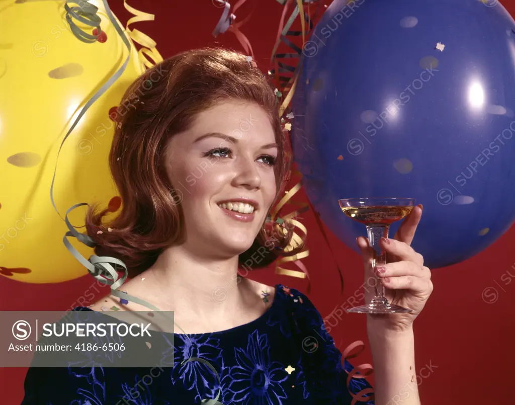 1960S Young Woman Smiling Toasting Toast Glass Champagne Balloons Streamers Background Party New Years