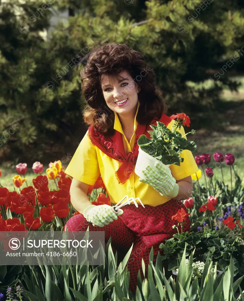 1980S 1990S Smiling Brunette Young Woman Gardening 