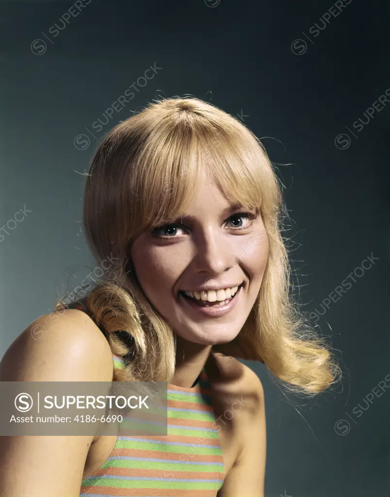 1960S Portrait Of Young Blond Woman Smiling Wearing Striped Sleeveless Top