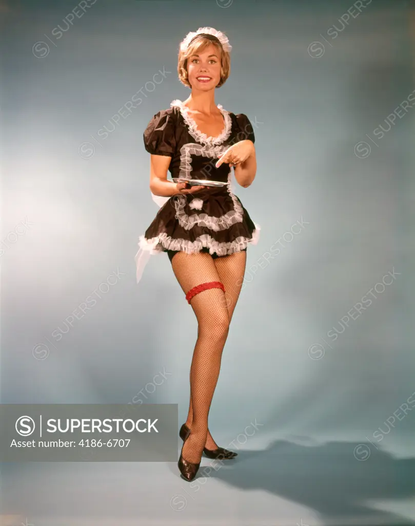 1960S Woman Smiling Wearing Short Black & White Lace French Maid Costume Pointing To Silver Tray  