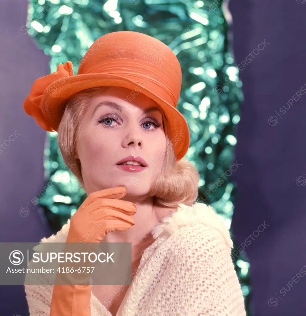 1960S Portrait Glamorous Blond Woman Orange Hat And Gloves High Fashion Style Clothes