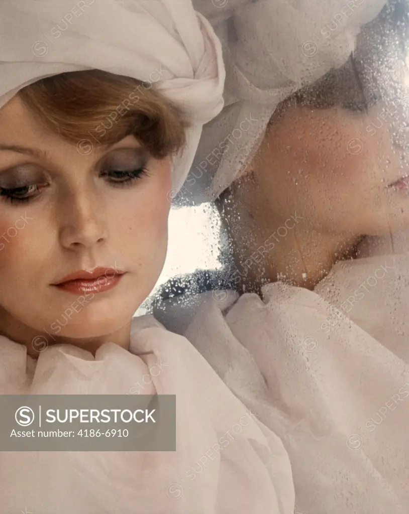 1970S Pensive Blond Woman In White Hat And Clothing Fashion