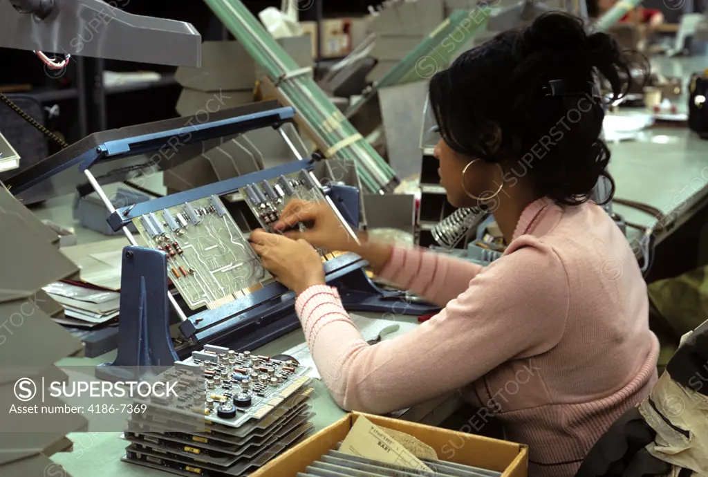 1970S Woman Assembling Computer