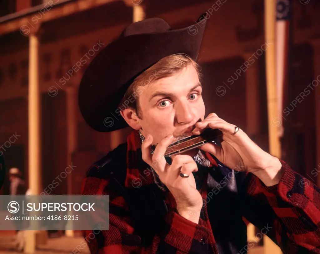 1960S 1970S Man Cowboy Hat Playing Harmonica