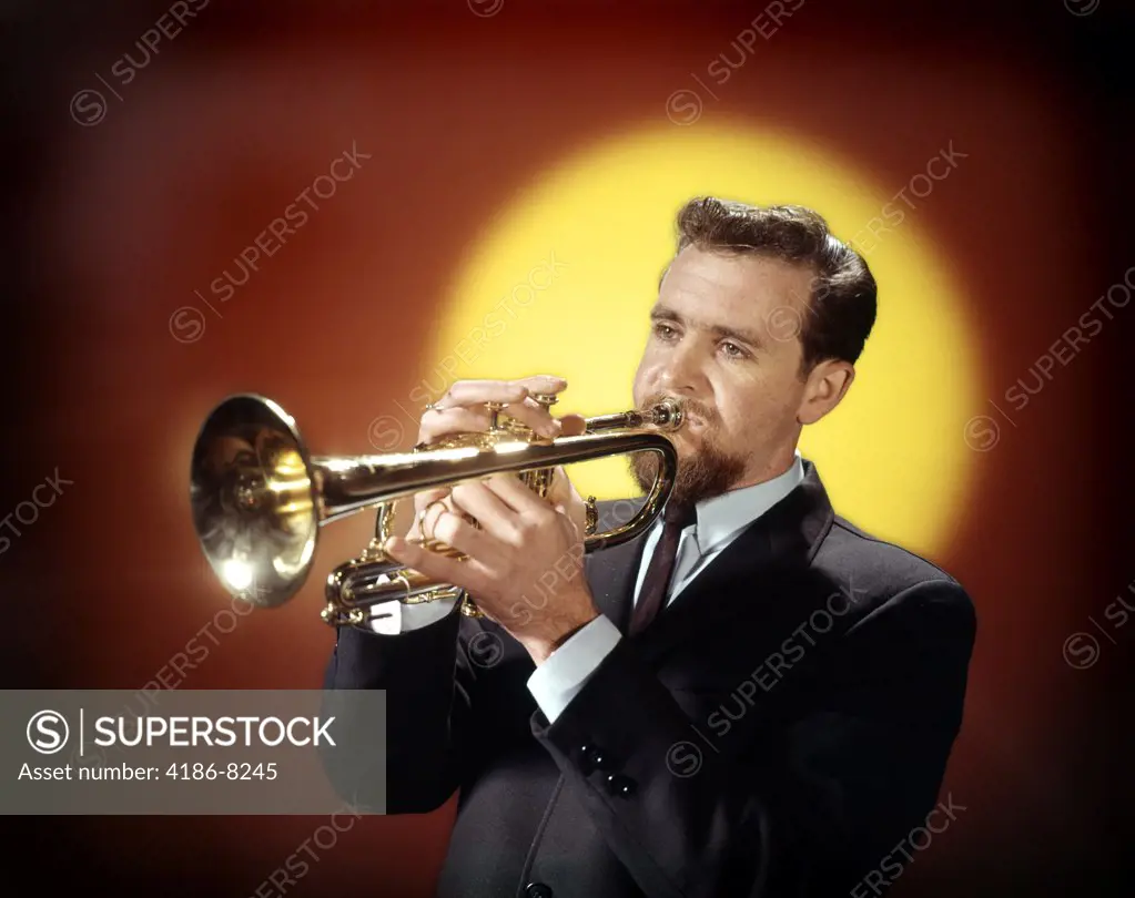 1960S Man Playing Trumpet Red Yellow Background