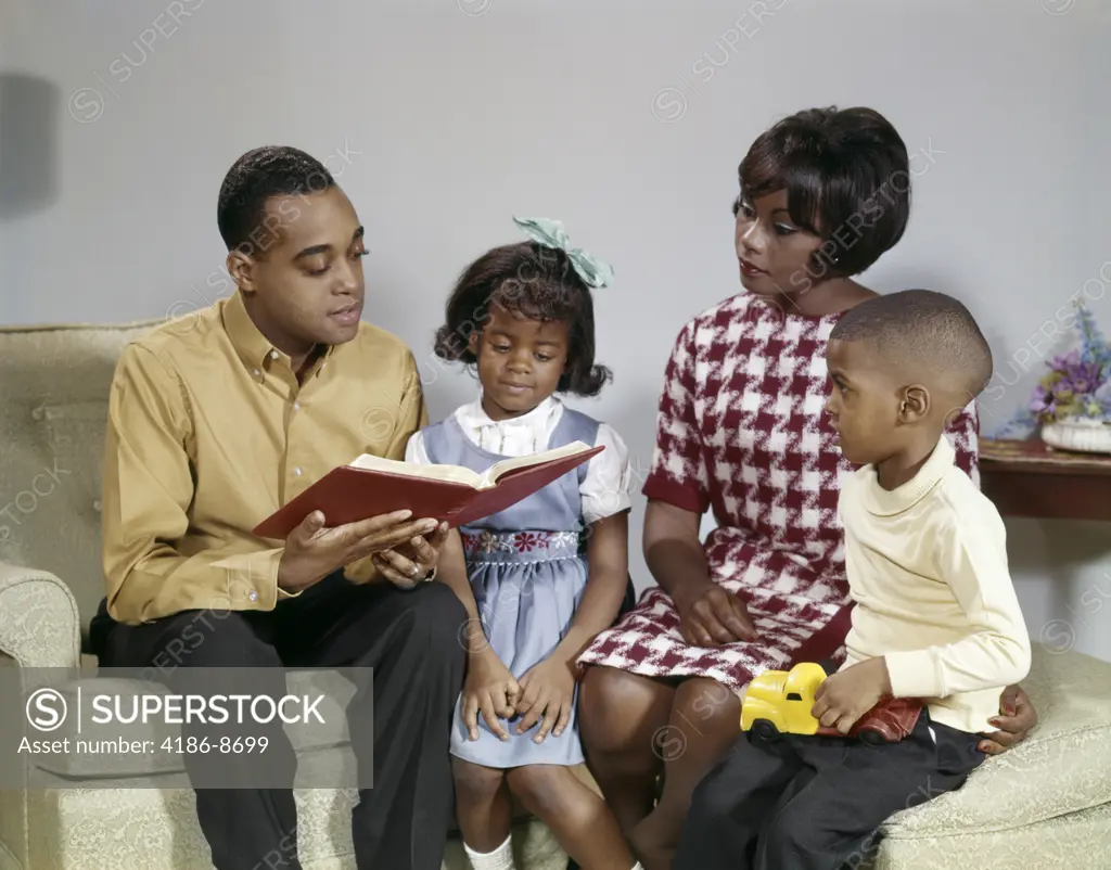 African American Family Reading A Book