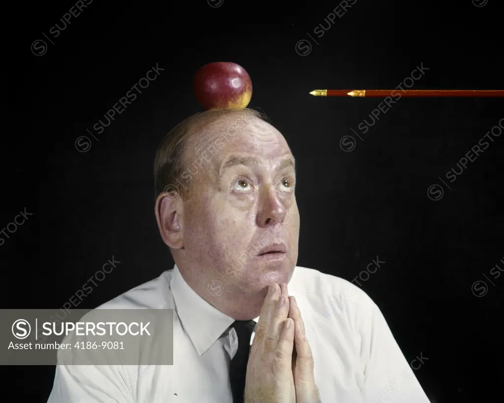 1960S Anxious Business Man Praying Looking Up At Arrow Directed Apple Top Head Symbolic William Tell