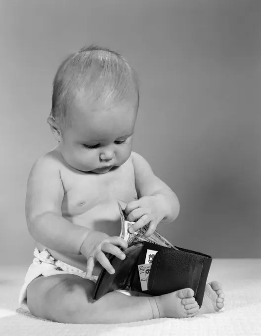 1960S Baby Sitting Wearing Diaper Taking Paper Money Out Of A Wallet