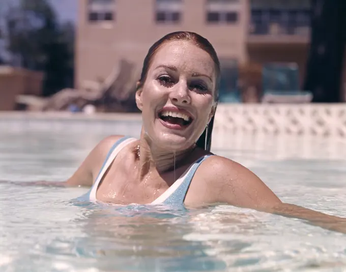 1960S Woman Laughing In Swimming Pool