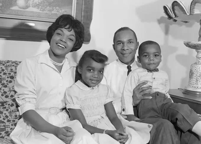 1960S Happy Smiling African-American Family On Couch