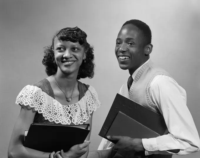 1950S Two Smiling African American Students Boy Girl Carrying Books Couple