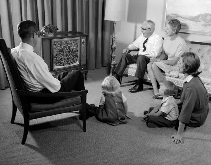 1960S 3 Generation Family Of 6 Watching Television