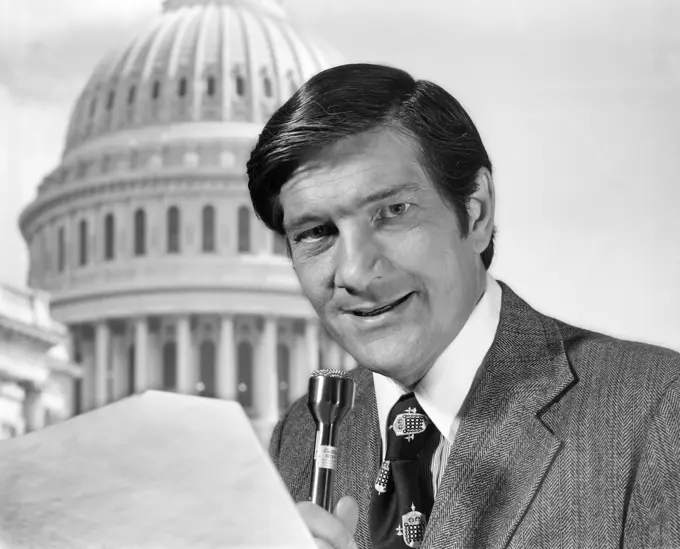 1970S Man Reporter With Microphone Standing Before Capitol Dome