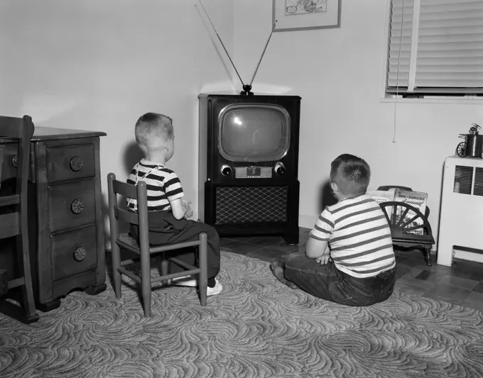 1950S Two Boys Sitting In Living Room Watching Television