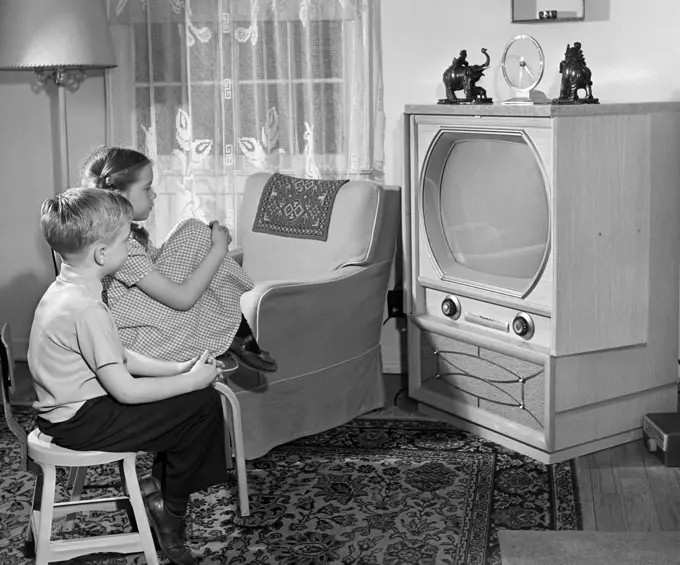 1950S Boy And Girl Watching Tv In Living Room