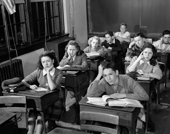 1940S 1950S High School Classroom Of Bored Students Sitting At Desks