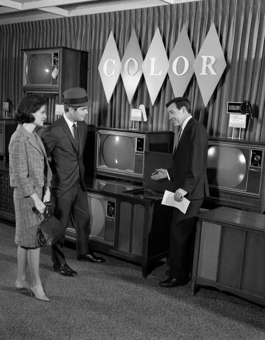 1960S Couple In Department Store With Color Tv Salesman