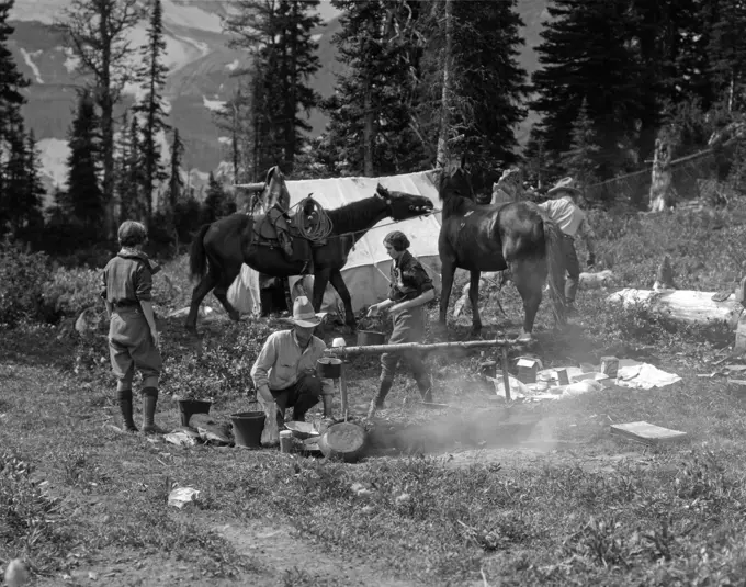 1930S Group Men Women At Campsite Cooking Fire Horses Campfire Wilderness Adventure Cowboy Tent Canada Assiniboine