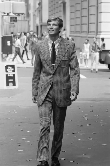 1970S Businessman In Suit Walking Down City Street