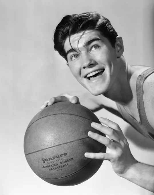 1950S Boy Posing Holding Basketball Smiling