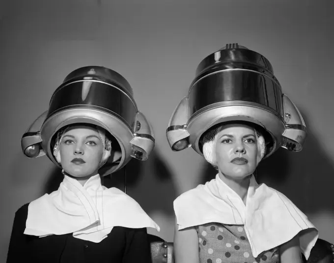 1950S Two Women Under Hair Dryers Towels Around Shoulders Hair Nets