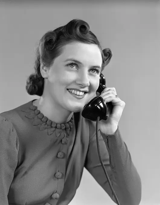 1930S 1940S Young Girl Talking On Telephone