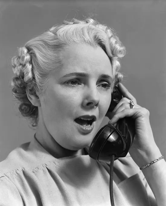 1930S Woman Talking On Telephone