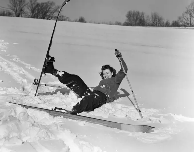 1930S Woman Falling In Snow On Skis Laughing