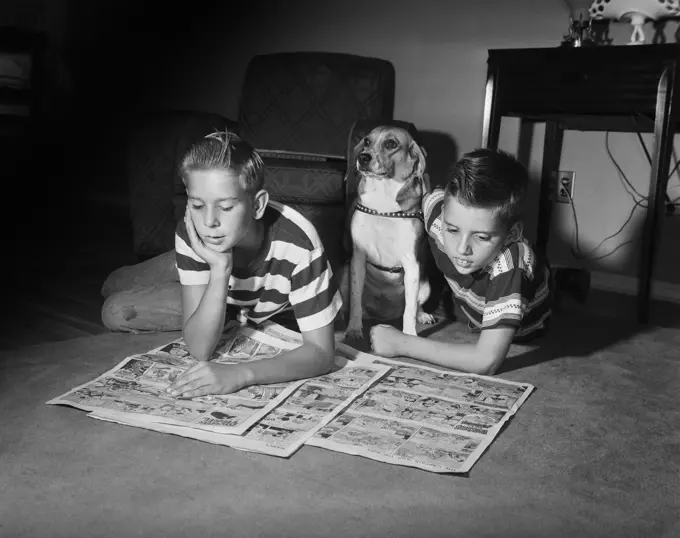 1950s TWO BOYS READING SUNDAY COMICS LIVING ROOM FLOOR DOG INDOOR FUNNY PAPERS NEWSPAPERS